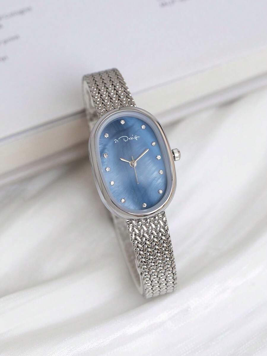 ساعة كوارتز مقاومة للماء بتصمي - مراجعة Mesh Stainless Strap وسعره