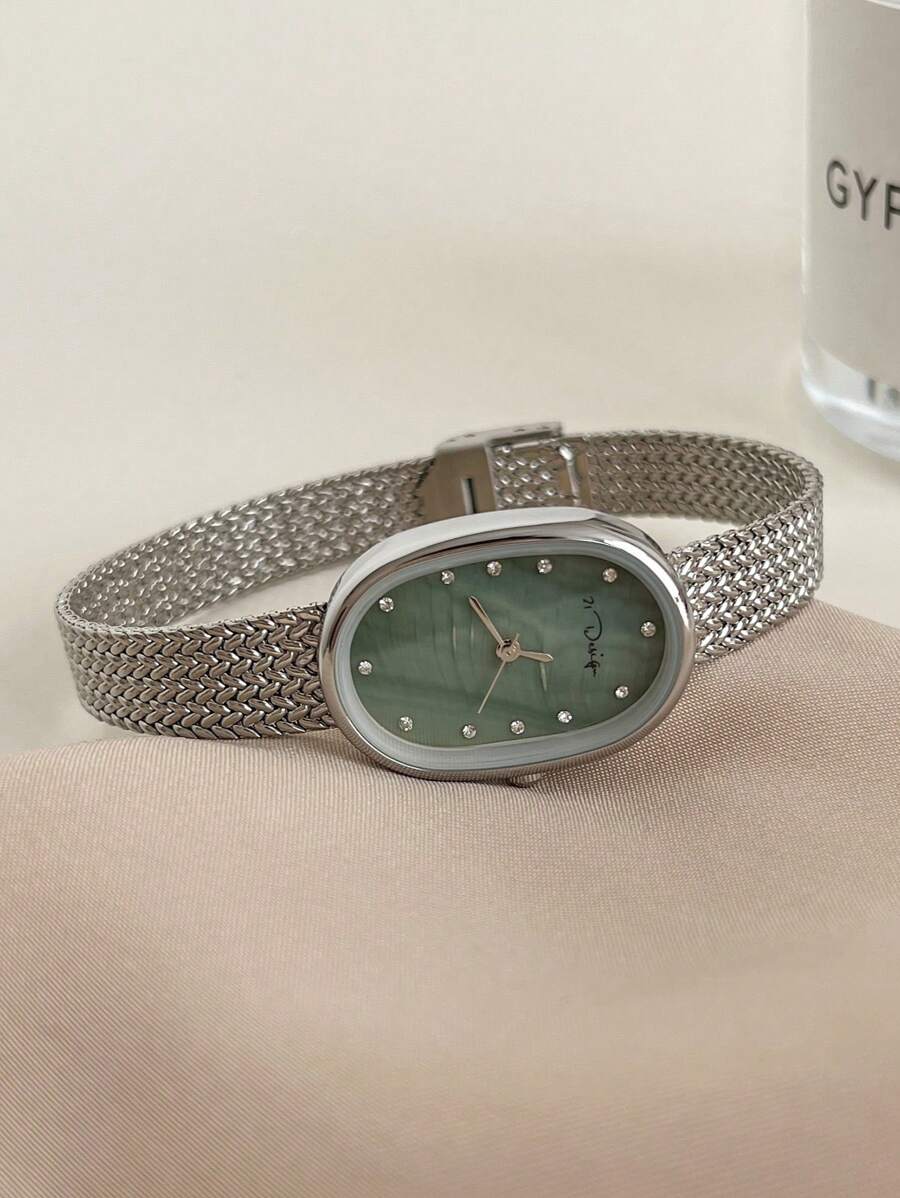 ساعة كوارتز مقاومة للماء بتصمي - مراجعة Mesh Stainless Strap وسعره