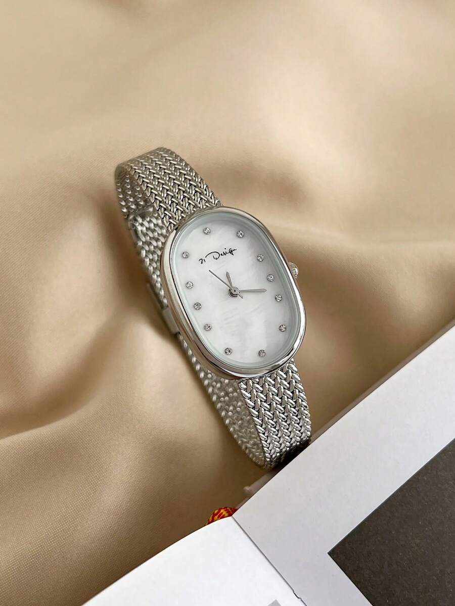 ساعة كوارتز مقاومة للماء بتصمي - مراجعة Mesh Stainless Strap وسعره